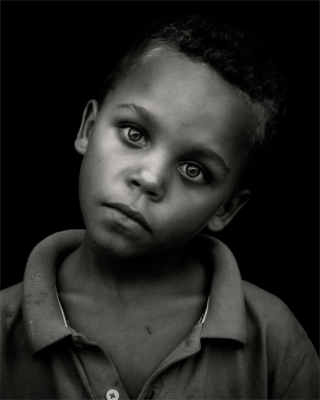 Portrait of a young Danish photojournalist with a camera