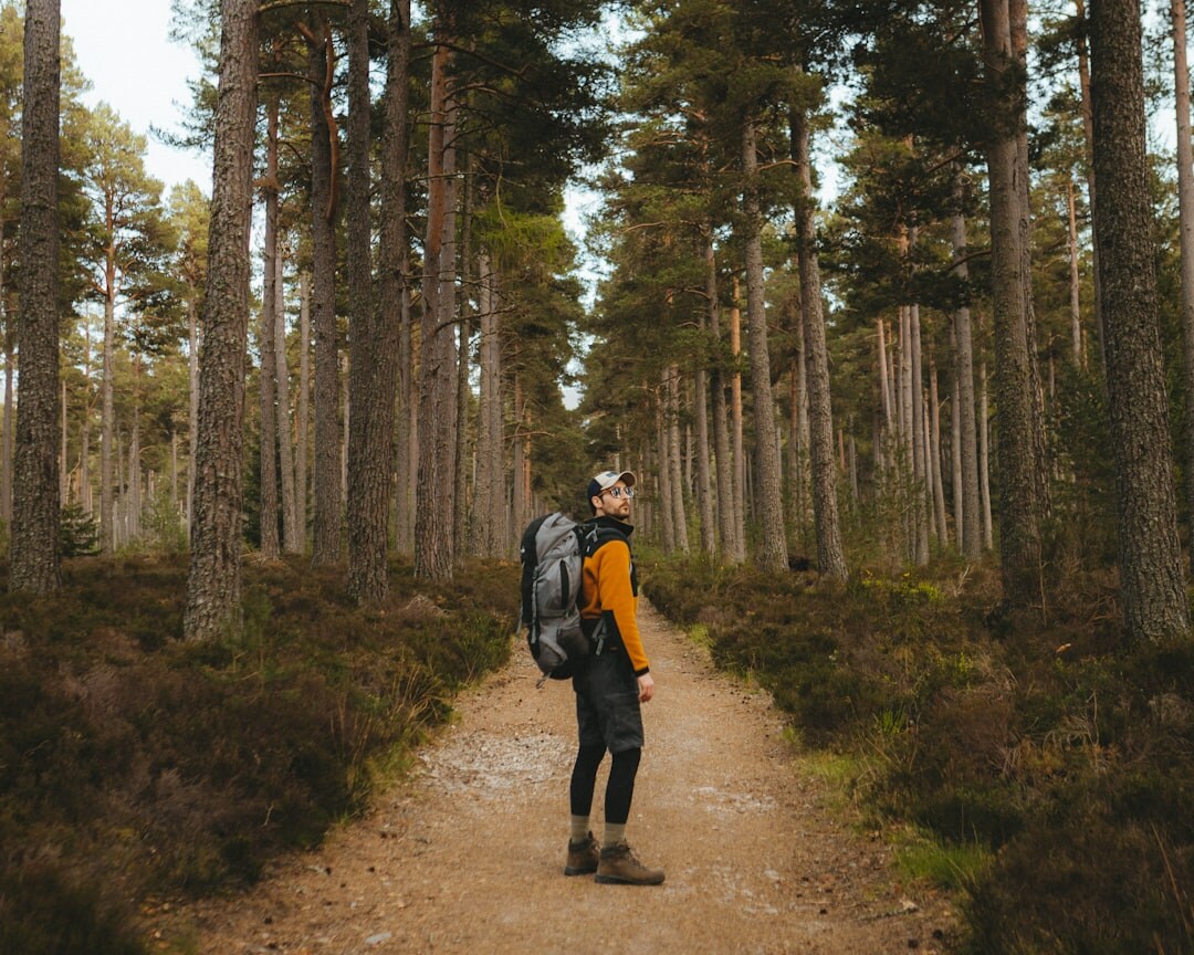 person walking in nature after financial meeting